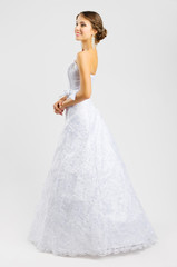 Fototapeta na wymiar Young woman in wedding dress
