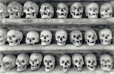 Human skulls inside a catacomb.