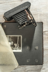 Vintage photo camera and album