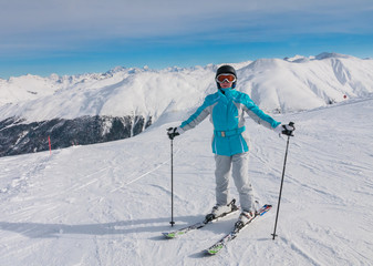 Fototapeta na wymiar Skier mountains in the background. Ski resort Livigno. Italy