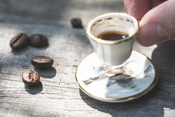 Cup of coffee on wooden table