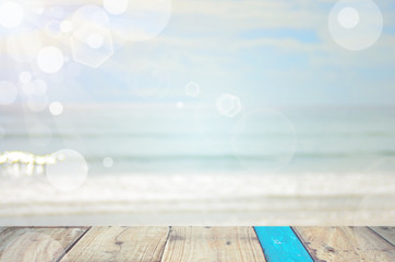 Fototapeta na wymiar Blur tropical beach with sun light abstract background.Travel concept.