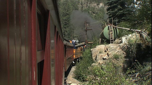Steam Locomotive Taking on Water