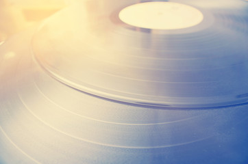 Segment of vinyl record with label showing the texture of the gr