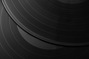 Segment of vinyl record with label showing the texture of the gr