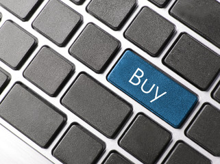 buy key on keyboard showing ecommerce or commerce concept