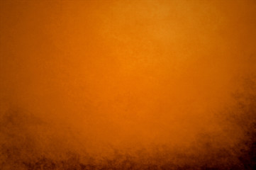 abstract orange background peach color center spotlight, dark br