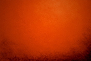 abstract orange background peach color center spotlight, dark br