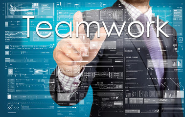 the businessman is pressing the button on the touch screen: Team