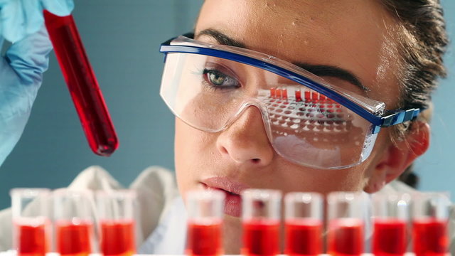 Cute science woman doing medical research