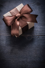 Gift box-container on vintage wood board holiday concept