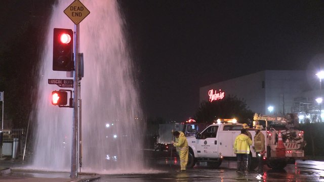 Water gushes out of a broken water main in Los Angeles.
