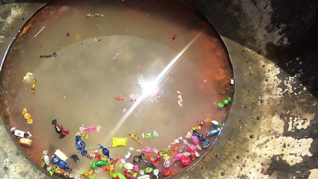 Prayer chan huge metal bowl with water for offerings in Buddhism close-up of the sun is reflected apple crisp candy
Erdene Zuu Buddhist monastery - one of the oldest monuments of Mongolia