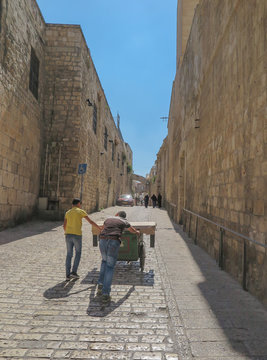 JERUSALEM, ISRAEL - JULY 15, 2015: Narrow stone street among sta