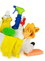 Household cleaning supplies in a box. Pure white background, soft shadows.