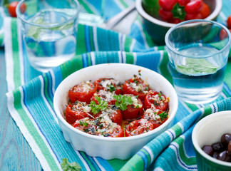 Roasted cherry tomatoes with cheddar cheese and Parmesan cheese, olive oil and aromatic herbs
