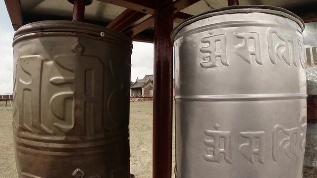 two reels of old prayer mantras inscribed in Sanskrit close up
Erdene Zuu Buddhist monastery - one of the oldest monuments of Mongolia