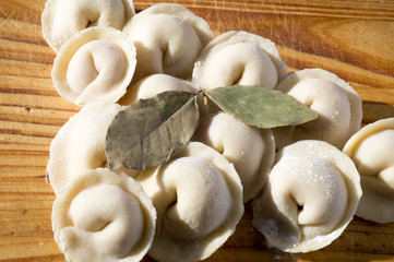 Pelmeni on a board.