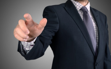 Businessman pressing an imaginary button