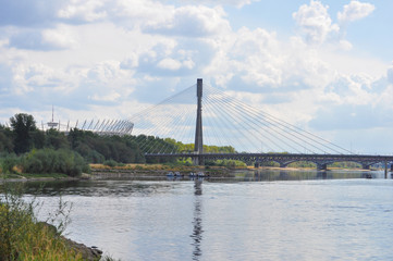 Fototapeta na wymiar Bridge over Vistula (Wisla) river in Warsaw