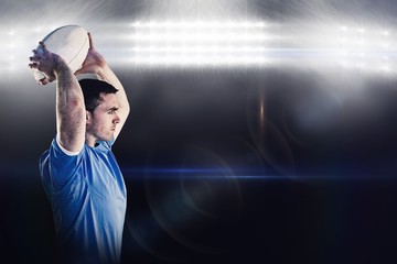 Composite image of disappointed rugby player holding his head