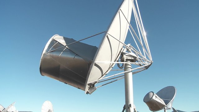 satellites pivot as they search the heavens for extra terrestrial life. 
