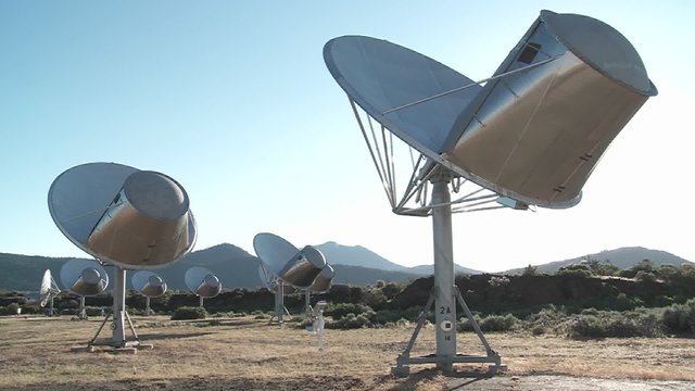 satellites search the heavens for extra terrestrial life. 