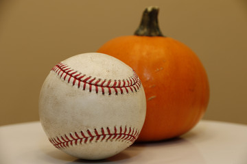 Objects: Baseball and pumpkin (orange)