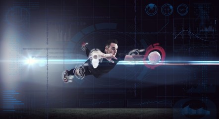 Composite image of rugby player scoring a try