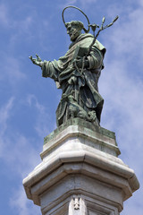 Fototapeta na wymiar Statue of San Domenico in Naples, Italy