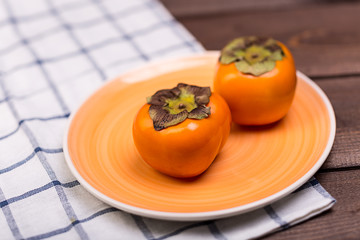 two persimmons