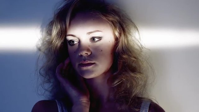 Sexy woman fashion model is sad and sultry