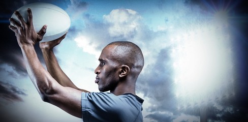 Composite image of athlete in position of throwing rugby ball