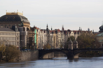 Quay Prague in the rays of the autumn evening sun