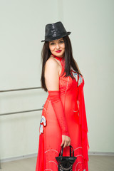 Girl dancing in dance studio, tango