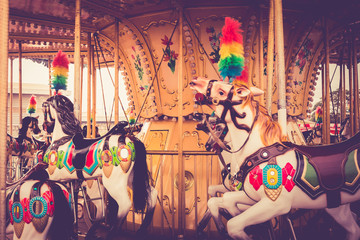 Carousel with horses vintage color