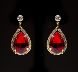 earring with colorful red gems 