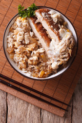 Katsudon fried pork tonkatsu with egg and rice closeup. Vertical top view
