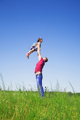 Fototapeta premium Father playing with daughter