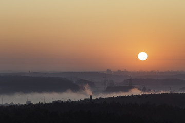 Fototapeta premium Early foggy morning over the city