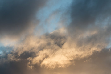 dramatic cumulus clouds at sunset