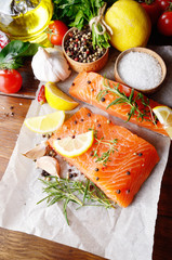 Raw salmon on baking paper