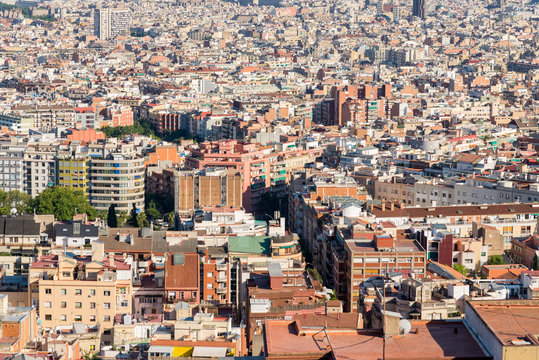 Top view from the Park Guinardo, one of the west side hills in Barcelona, to the city Barcelona with a sea of houses and urban canyons. Barcelona is one of the most densely populated cities in Europe 