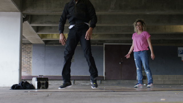 4K Two breakdancers having a friendly dance battle, shot on Red Epic Dragon