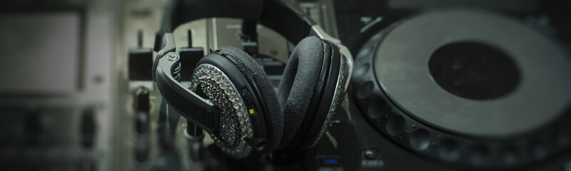 Mixer console and headphones