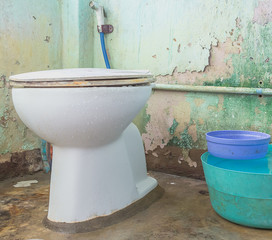 dirty old toilet bowl
