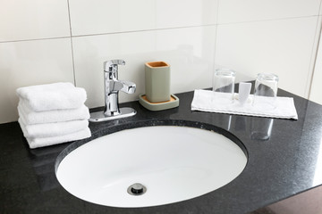 Bathroom sink at restroom hotel interior