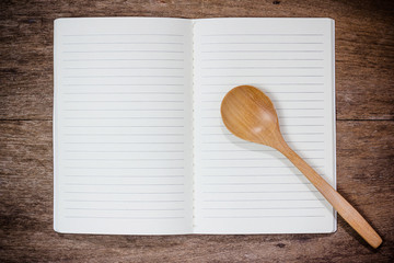 recipe book and spoon