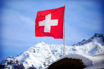 Switzerland flag Over Swiss Mountains