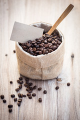 Fototapeta na wymiar coffee beans in sack with label